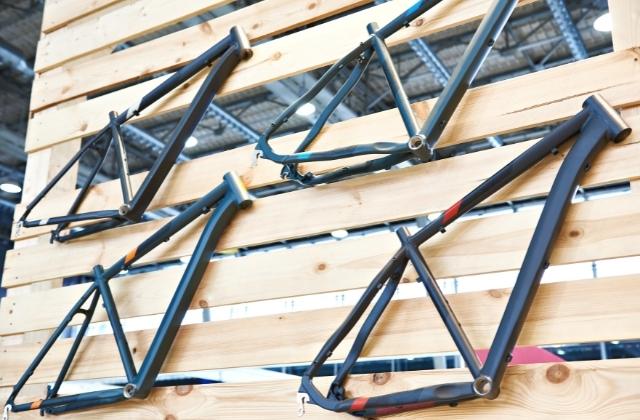 bicycle frames displayed on a wall